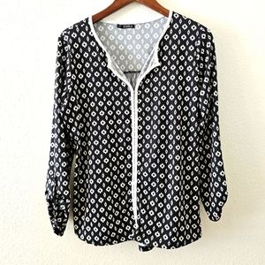 Storybuk top size M black white print V neckline long tab roll sleeve stretchy